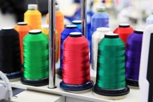 Cone with Threads Near Textile Factory Mechanisms